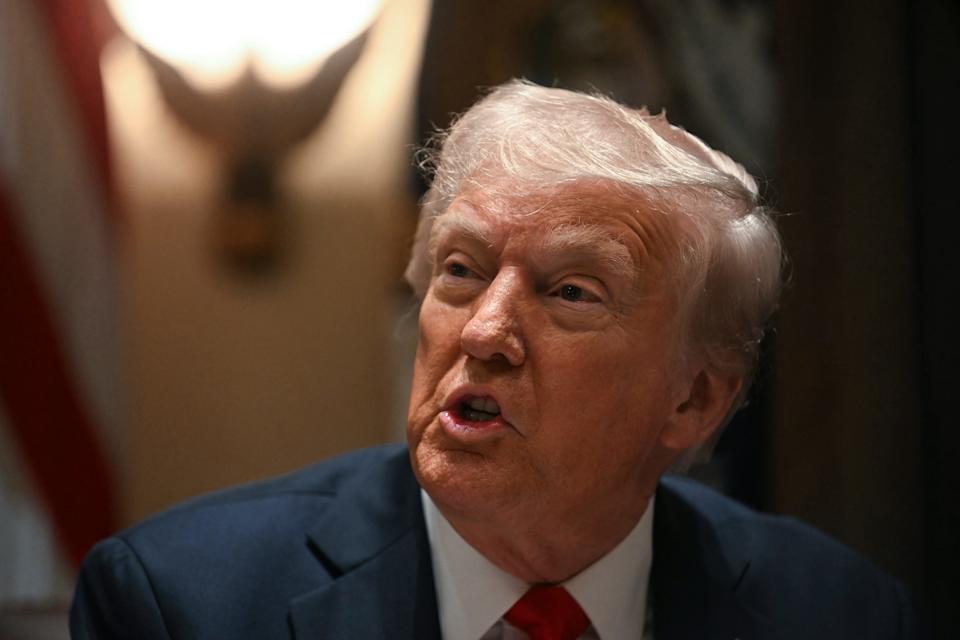 President Donald Trump speaks during a cabinet meeting at the White House in Washington, DC, on February 26, 2025.