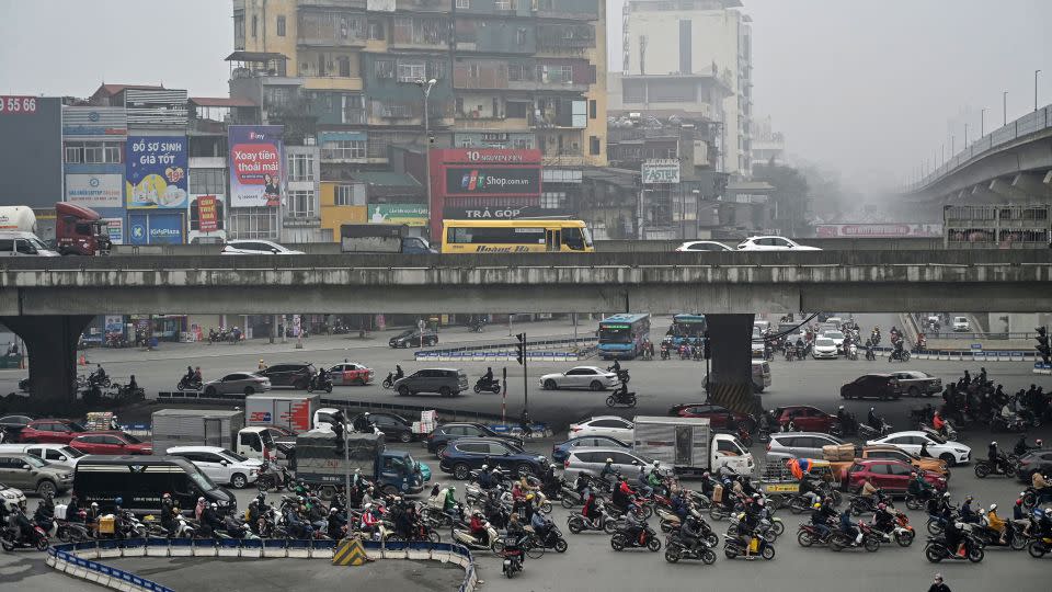 Vehicles run in the middle of a high level of air pollution in Hanoi, Vietnam, on March 5, 2024. - Nhac Nguyen/AFP/Getty Images