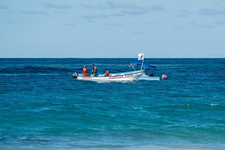 Civil defense boats are looking for Sudiksha Konanki, a university student from the US who disappeared on a beach. (AP)