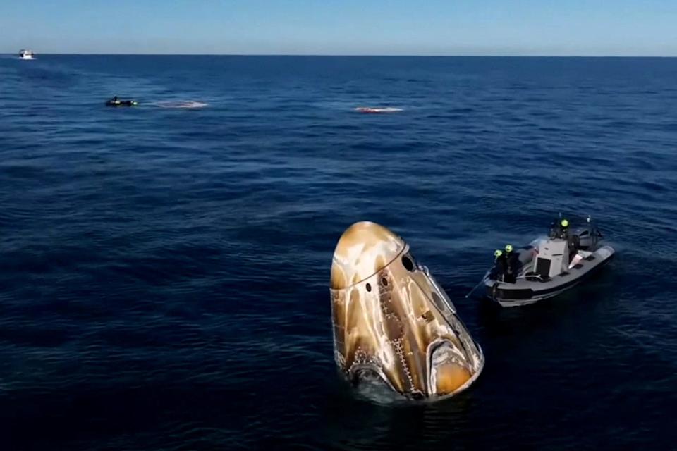 The Crew Dragon Capsule with Butch Wilmore and Suni Williams and two other astronauts floats after their Spatdown after their return to Earth from the international space station off the coast of Florid on March 18, 2025 in a stationary image of video.