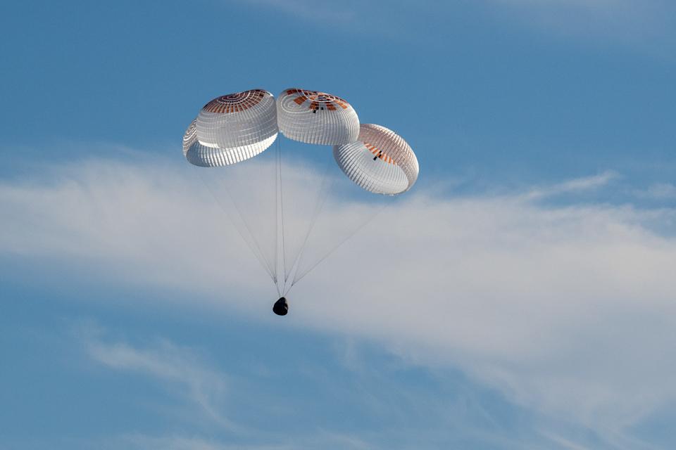 A SpaceX Dragon spacecraft is seen because it lands with NASA astronauts Nick Hague, Suni Williams, Butch Wilmore and Roscosmos Cosmonaut Aleksandr Gorbunov on the coast of Tallahassee, Florida.