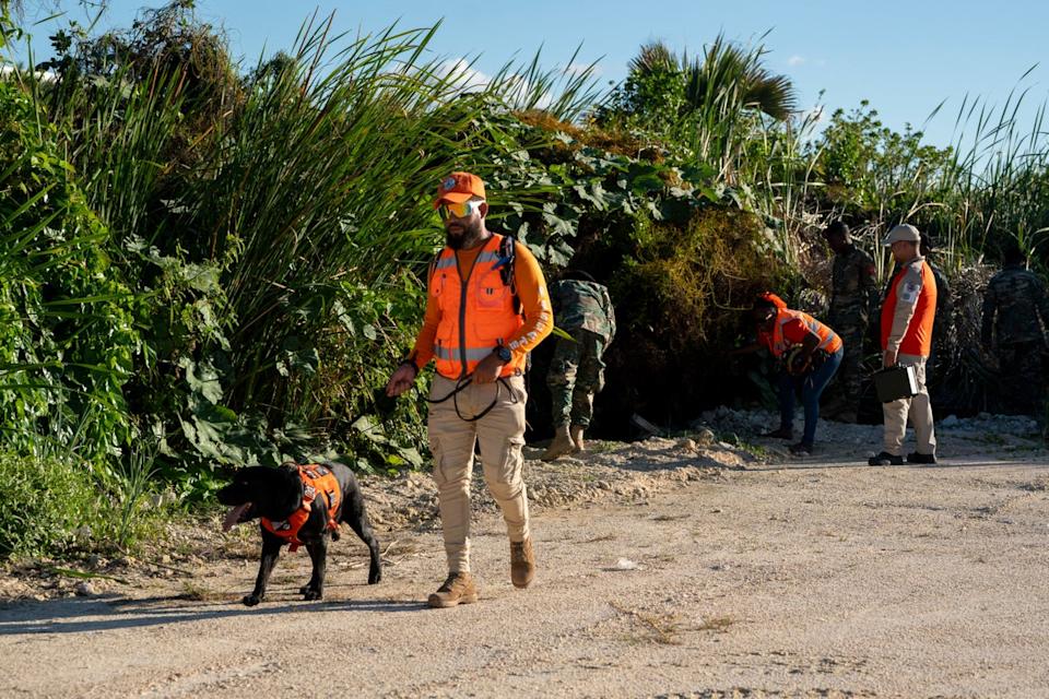 A member of the Burgerdond unit searches for Sudiksha Konanki, a university student from the US who disappeared on a beach in Punta Cana, Dominican Republic. (Copyright 2025 The Associated Press. All rights reserved)