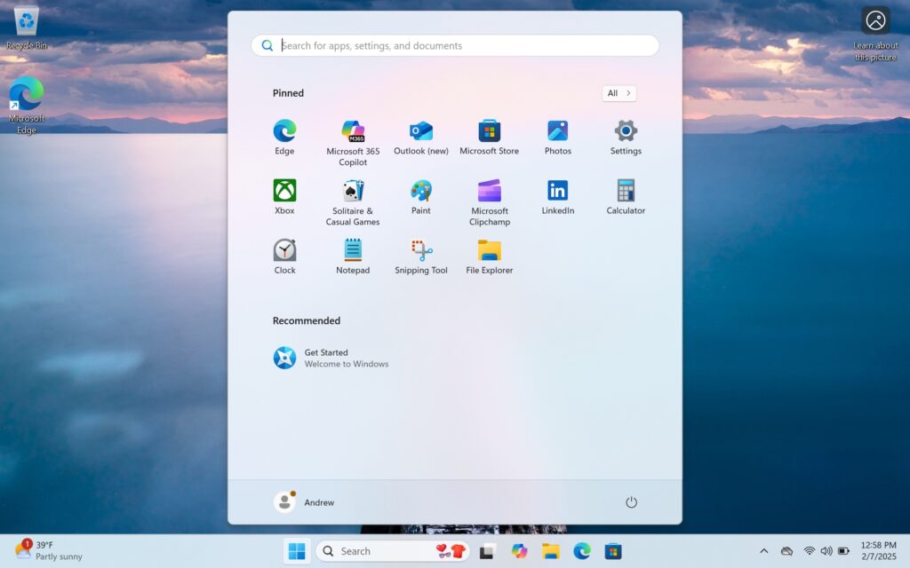 A desktop with an extra informative background icon, a Start menu full of apps you may or may not use, and a busy taskbar greet you the first time you log into Windows 11.