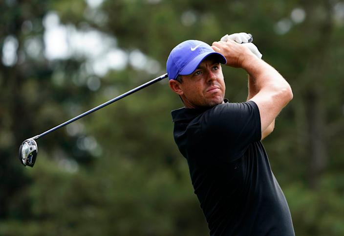 Apr 8, 2021;  Augusta, Georgia, USA;  Rory McIlroy hits his tee shot on the 18th hole during the first round of The Masters golf tournament.  Mandatory Credit: Michael Madrid-USA TODAY Sports