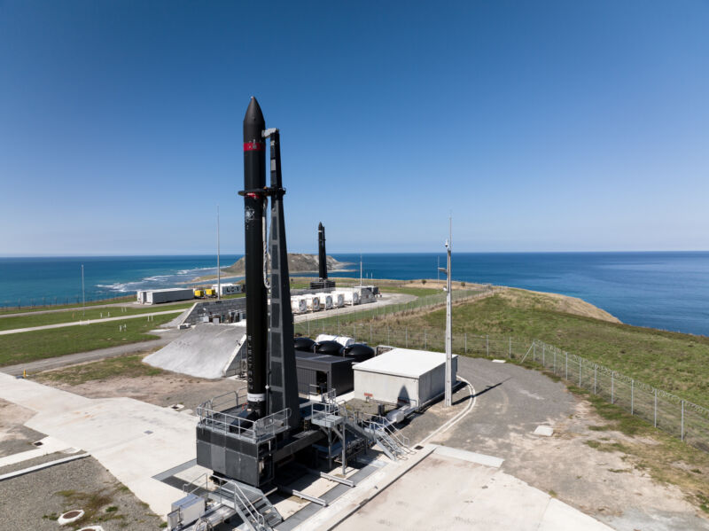 Giant missile launchers on a Pacific coast.