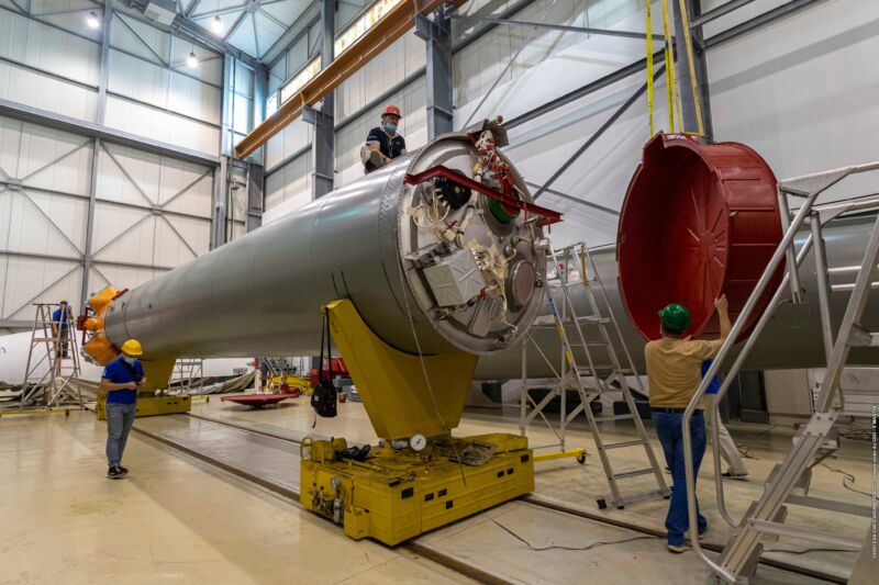 Russian workers assemble a Soyuz rocket to launch satellites for the European Space Agency in December 2021.