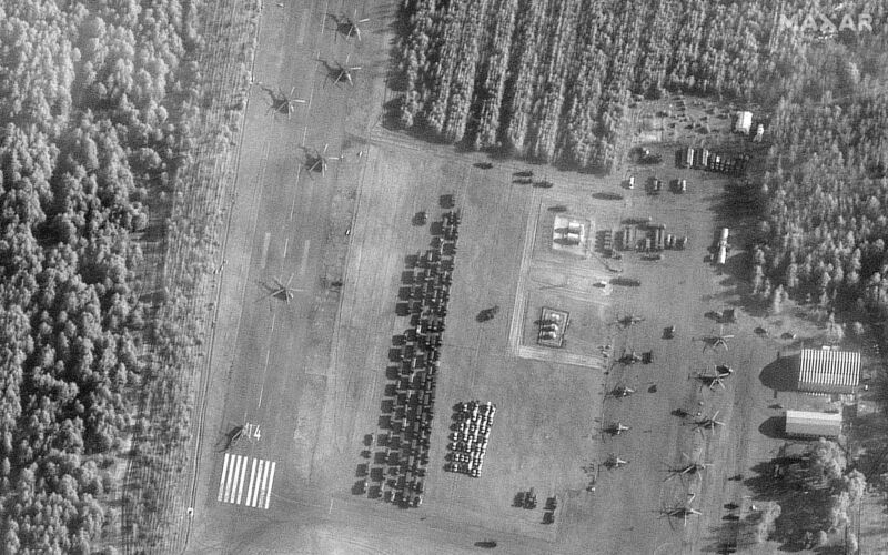 A satellite image from Maxar shows the build-up of Russian vehicles and helicopters at an airport in Belarus prior to the invasion of Ukraine.