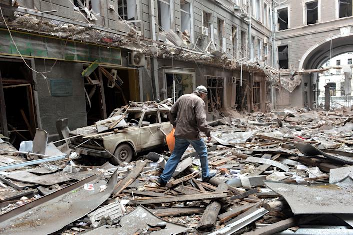 Shelling of damaged buildings in Kharkiv, Ukraine's second largest city, on March 3, 2022.