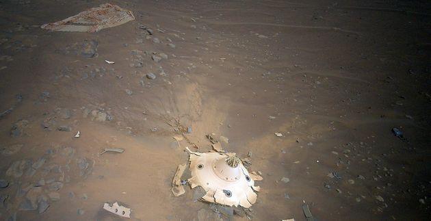 Cables emerge from the backshell to the supersonic parachute that brought the Ingenuity helicopter and Perseverance rover to Mars.  (Photo: NASA/JPL-Caltech)