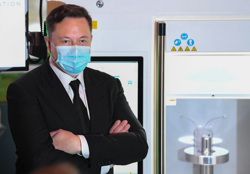 Elon Musk, CEO of Tesla and SpaceX, presents a vaccine production device at a meeting on September 2, 2020 in Berlin, Germany.  Musk met with vaccine maker CureVac, with whom Tesla has a partnership to build devices for producing RNA vaccines.