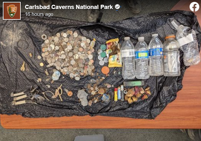 The garbage found at the bottom of the bottomless pit included $14.36 in loose change, the park says.