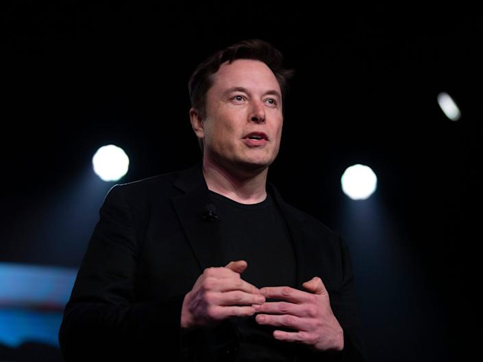 Tesla CEO Elon Musk speaks before unveiling the Model Y at the company's design studio in Hawthorne, California.