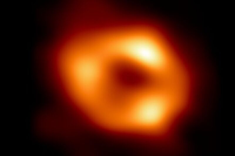 This is the first image of Sgr A*, the supermassive black hole at the center of our galaxy.  It is the first direct visual evidence of the presence of this black hole.  It was captured by the Event Horizon Telescope (EHT).