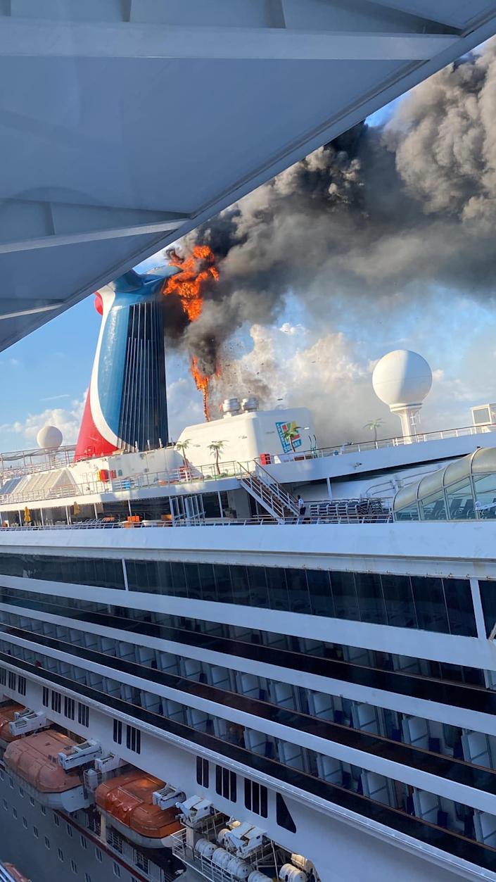 Katie Bushnell took this photo of the funnel fire on the Carnival Freedom while aboard Carnival's Mardi Gras at an adjacent cruise berth in Grand Turk.