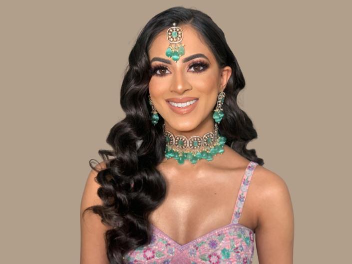 Tanvi Shah wears traditional South Asian jewelry