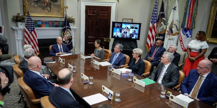 A general view of attendees at an offshore wind meeting, with President Joe Biden at the head of the table, in the Roosevelt Room of the White House on June 23, 2022