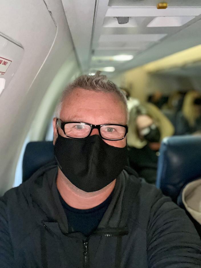 USA TODAY reporter Trevor Hughes on a United Express flight to Dulles International Airport on April 18, 2022.