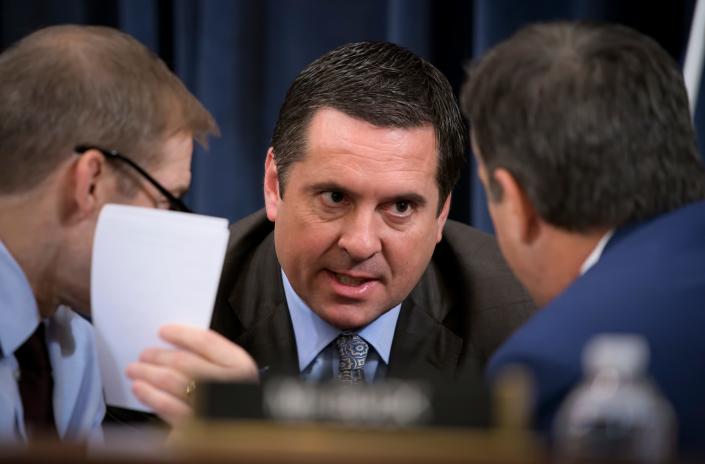 Rep.  Devin Nunes, R-Calif, then House Intelligence Committee member, center, talks to Rep.  Jim Jordan, R-Ohio, left, and Rep.  John Ratcliffe, R-Texas, during a pause at the House Judiciary Committee hearing, given the investigation results in the impeachment inquiry against President Donald Trump, on Capitol Hill in Washington, Dec. 9, 2019. Nunes will leave the House late this year to former President Donald Trump.