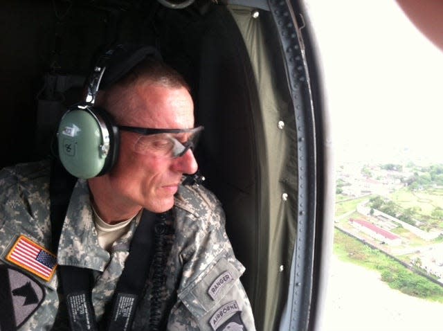 Major General Gary Volesky flies over Liberia.