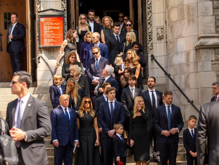 Donald Trump and family members gathered outside a church.