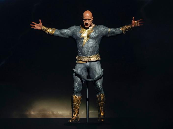 Dwayne Johnson on stage of the Warner Bros. panel promoting 'Black Adam' at San Diego Comic-Con.