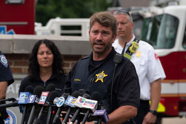 Lake County Sgt.  Christopher Covelli speaks at the scene of the July 4 shooting in Highland Park, Illinois, where a gunman killed at least six people and injured dozens of others.  (Photo: YOUNGRAE KIM via Getty Images)