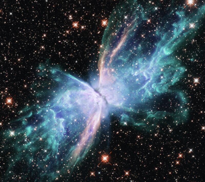 The Butterfly Nebula, located just under 4,000 light-years from Earth in the constellation Scorpio, is a striking example of a planetary nebula, the final stage in the evolution of a small to medium star.  The translucent 