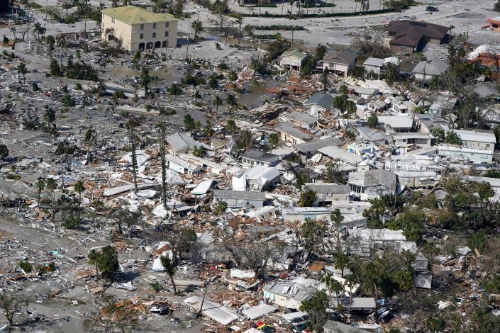 Damaged homes and debris are shown in the wake of Hurricane Ian on Thursday in Fort Myers, Florida.