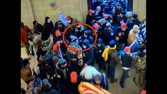 Prosecutors say the women in the red circle are Cara Hentschel and Mahailya Pryer as they enter the Capitol through the doors of the Rotunda on Jan. 6, 2021.