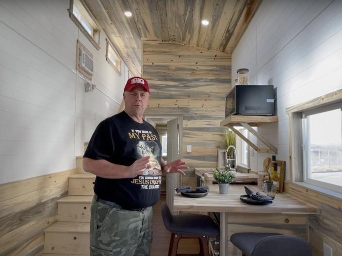 A screenshot from the Holy Ground Tiny Homes YouTube channel.