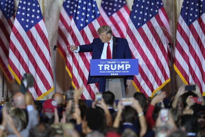 Former President Donald Trump gestures to supporters after announcing a third presidential nomination at Mar-a-Lago in Palm Beach, Florida, on Tuesday night.  (AP Photo/Rebecca Blackwell)