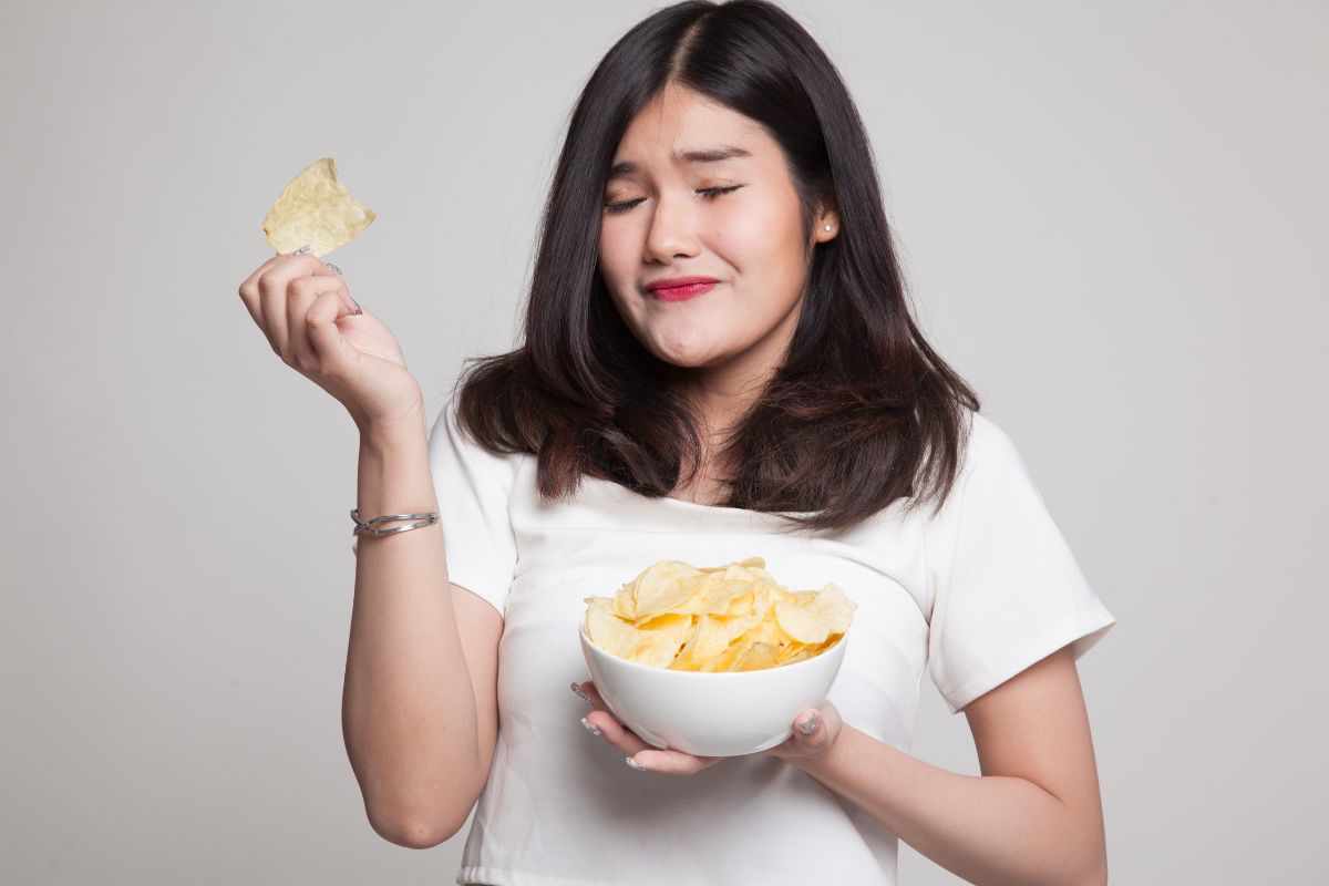 Woman with a bowl of chips