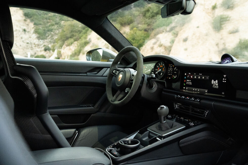 Porsche's bucket seats can be difficult to get in and out of, but once you're in, they're great.  However, there is no rear seat in this version.