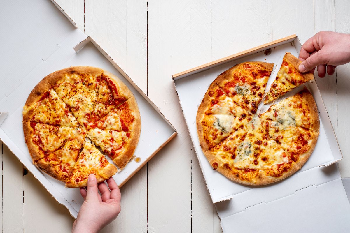 two boxes of pizza on the table