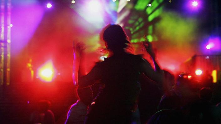 Partygoer in a nightclub in Bali