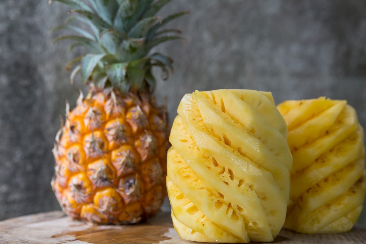 two peeled pineapples