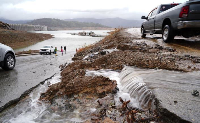 Water flows down the hill into the Centimudi Boat Launch on Lake Shasta near Shasta Dam on Sunday, January 8, 2023.