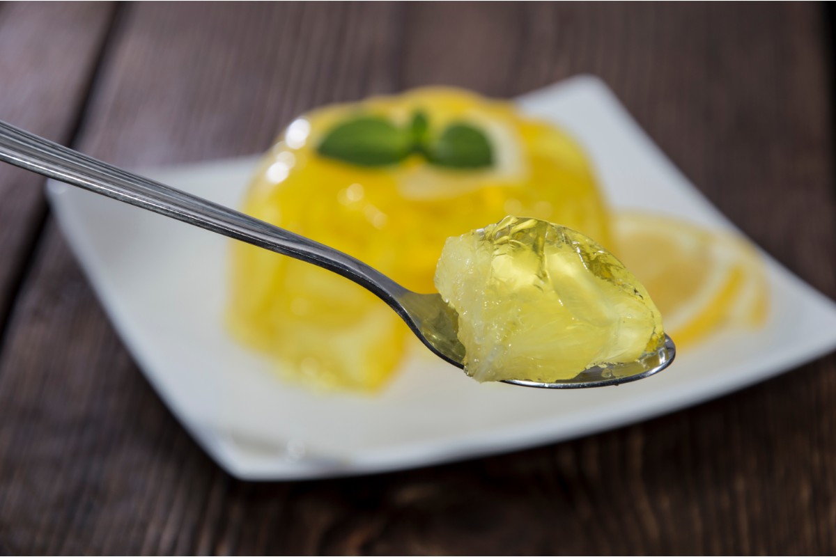 Lemon gelatin in a spoon