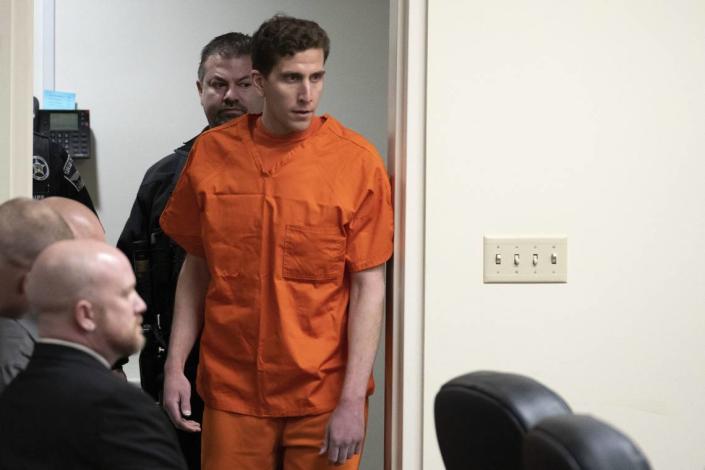 Bryan Kohberger, right, accused of murdering four University of Idaho students in November 2022, appears at a hearing in Latah County District Court in Moscow, Idaho, on Thursday, January 5, 2023.  (AP Photo/Ted S. Warren, Pool)