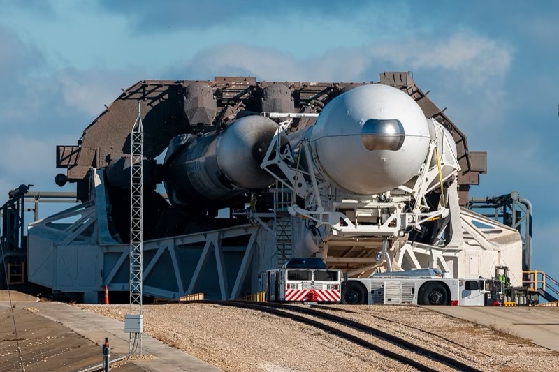 On Saturday, January 14, 2023, a Falcon Heavy rocket rolls to the launch pad.