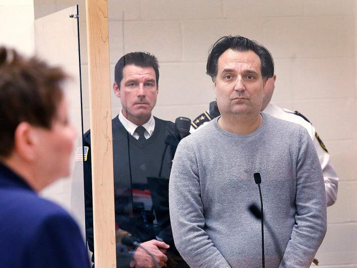 Brian Walshe, of Cohasset, faces a Quincy Court judge charged with obstructing the investigation into his wife Ana's disappearance from their home on Monday, Jan. 9, 2023. (Greg Derr/The Patriot Ledger via AP, pole)