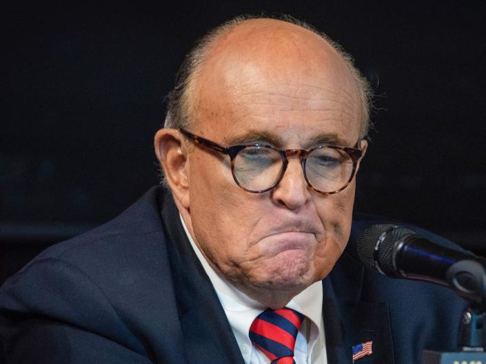 Rudy Giuliani frowns