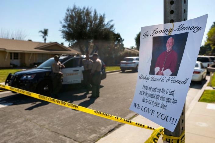 Los Angeles County Sheriff's Deputies guard the street entrance of Bishop David O'Connell's home in Hacienda Heights, California, on Sunday.