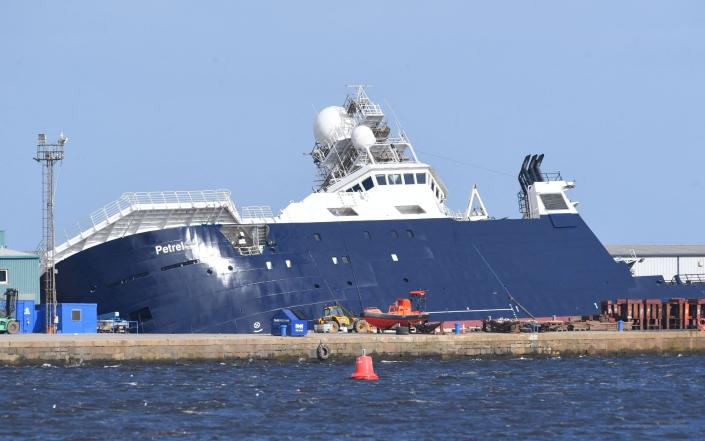 A spokeswoman for Scotland Police said: “Officers and colleagues from the emergency services are responding to an incident at Imperial Dock in Leith, Edinburgh, where a ship has become drydocked out of its port.  -ANDY BUCHANAN/AFP via Getty Images