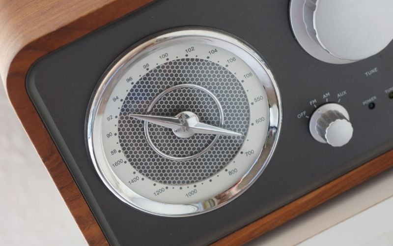 Close wooden radio with white dials