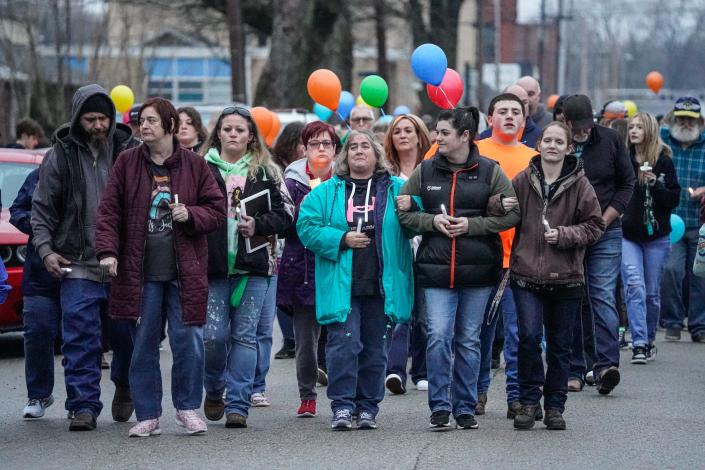 The family and friends of the missing Scottie Dean Morris lead a candlelight vigil and march from Grace and Mercy Full Gospel Church to a nearby park where a cross was erected in Eaton, Indiana on Thursday, March 23, 2023.  Morris, 14, left his family's home in Eaton on Thursday, March 16, 2023 at around 8:30 p.m. and has not been seen since.