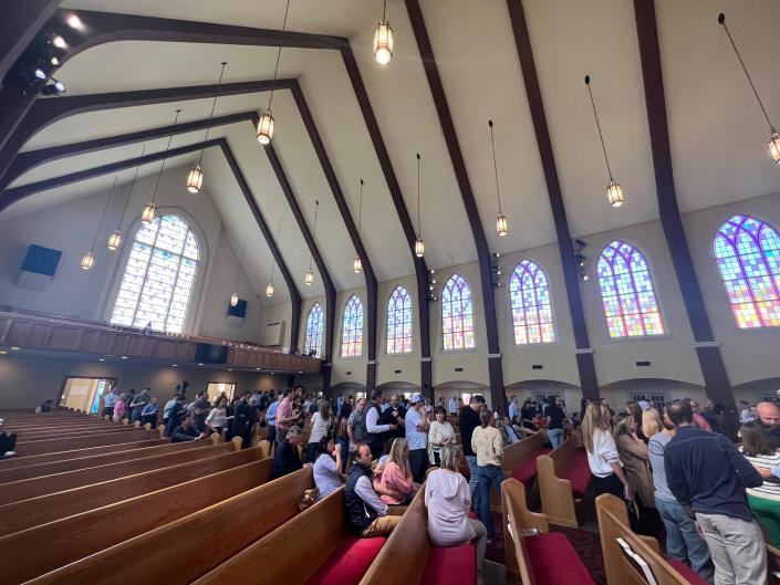 Parents wait for their children, Monday, March 27, 2023 after a school shooting at Covenant School in Green Hills, Nashville