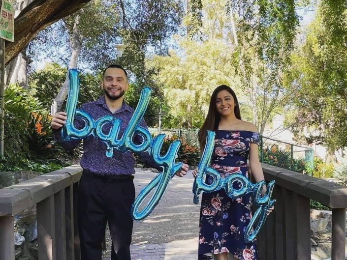 A couple, who later discovered their IVF had a mutated cancer gene, is shown at his gender reveal