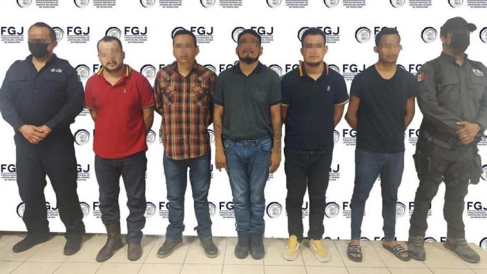 The five suspects were paraded in front of cameras by Mexican police