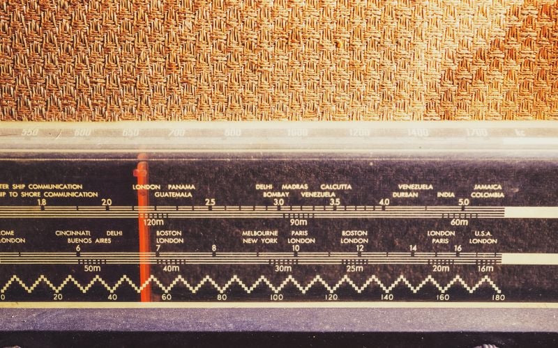 Russian shortwave radio close-up with a red dial